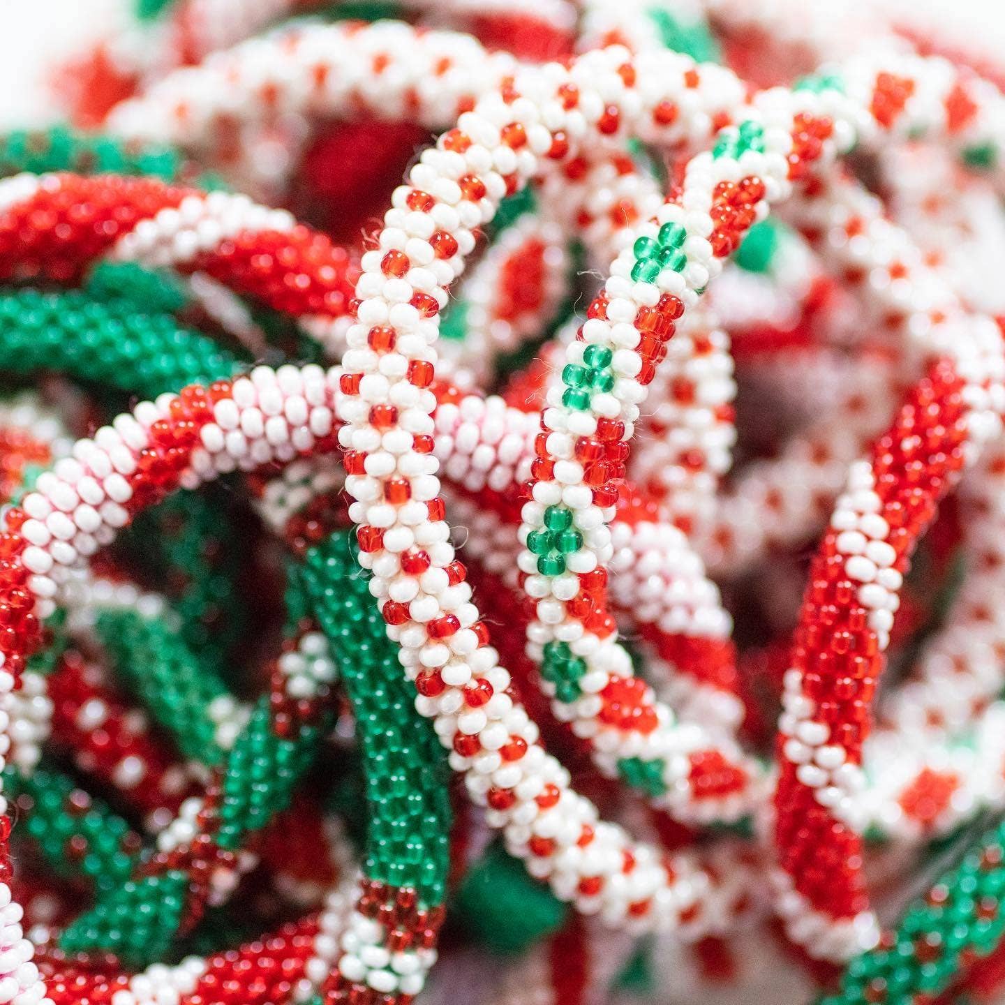 Aid Through Trade - Wholesale Jewelry Set - Roll-On® Christmas Bracelets (Mistletoe) - Set of 125