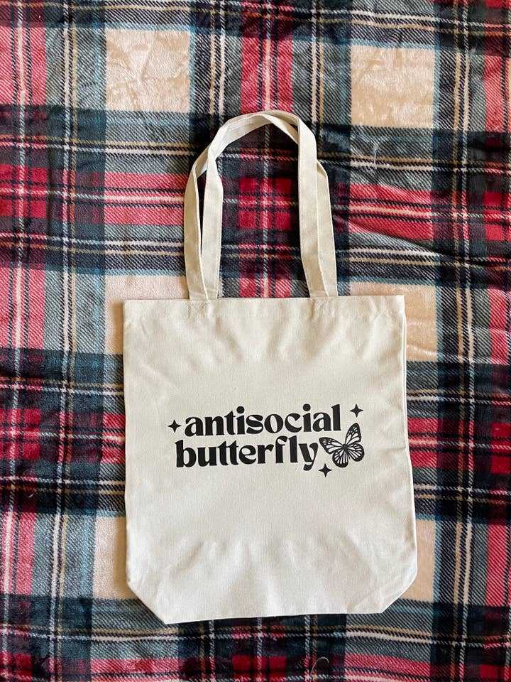 Farfalla antisociale, borsa in tela, borsa della spesa riutilizzabile per la vendita all'ingrosso da parte di Jeanne Mari & Co