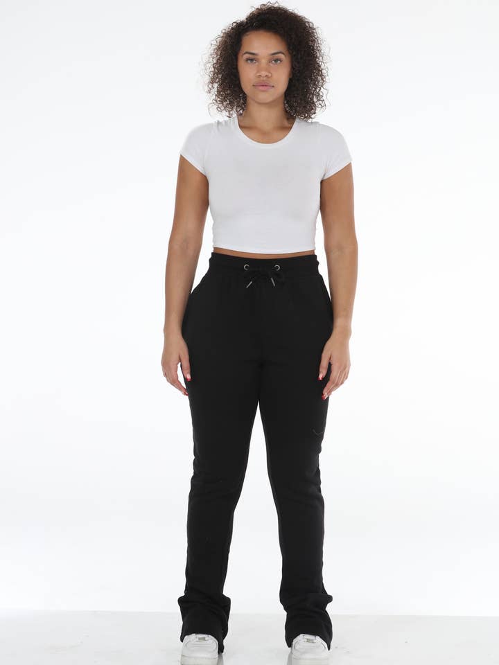 Chandails évasés empilés noirs pour la vente par Stylo