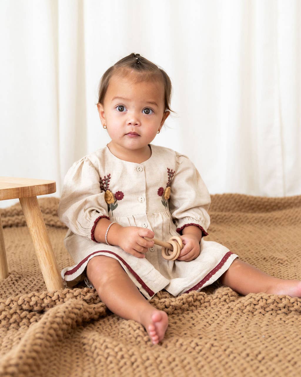 Natural Ravello Embroidered Baby Dress & Bloomer (Linen Blend) for wholesale on Faire6