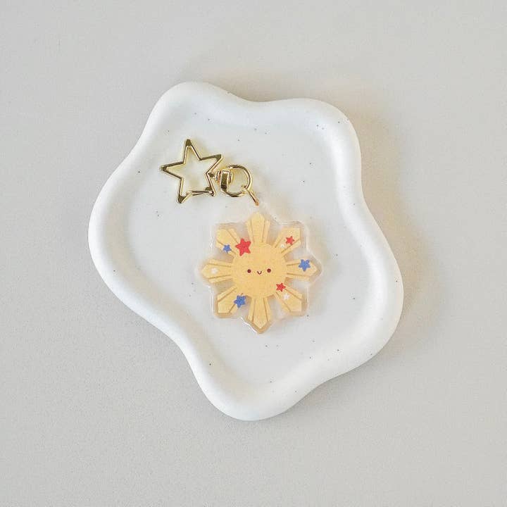 Philippinischer Sonnen-Glitzer-Acrylschlüsselanhänger für den Großhandel von Scotty&Mel