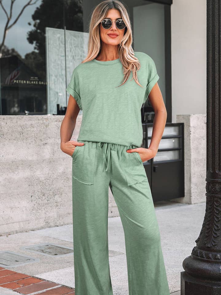 Set di maglietta a maniche corte con polsini Canton, cucitura grezza, tasca applicata e pantaloni con coulisse. per la vendita all'ingrosso da parte di Lovesoft