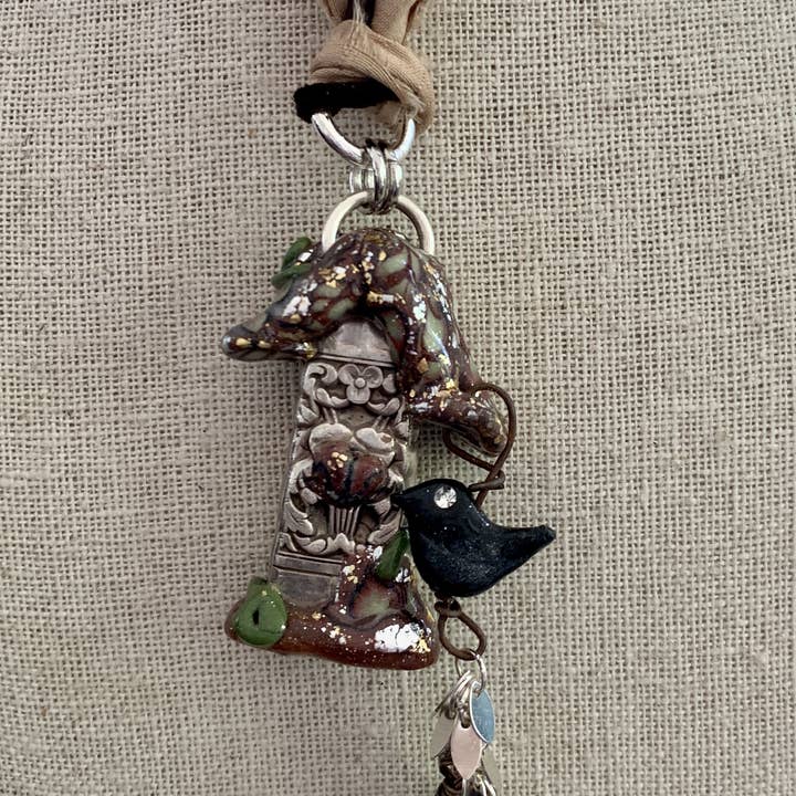 Tiny Bird House Necklace for wholesale by Catie Raymond Designs