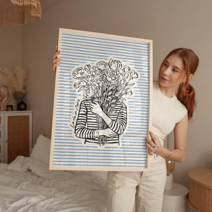 Woman Holding Flowers Print for wholesale by Pink Giraffe Print Co