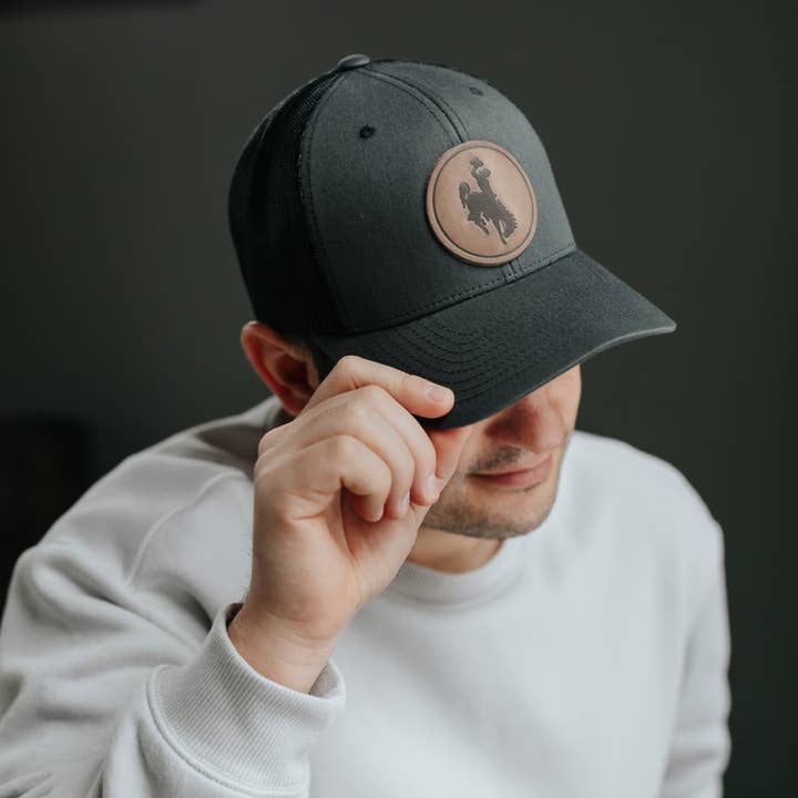 Range Leather Co. - Wholesale Trucker Hat - Unisex - Steamboat Hat - University of Wyoming Leather Patch Hat