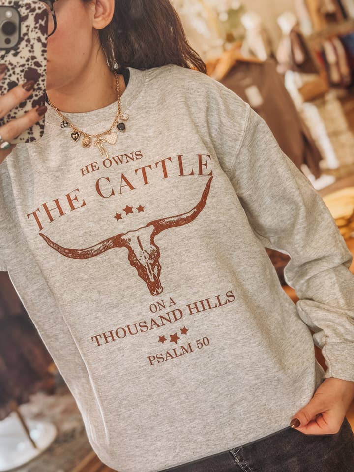 Amy Anne Apparel Inc - Wholesale Graphic Sweatshirt - Women's - He Owns The Cattle Crew Neck Sweatshirt