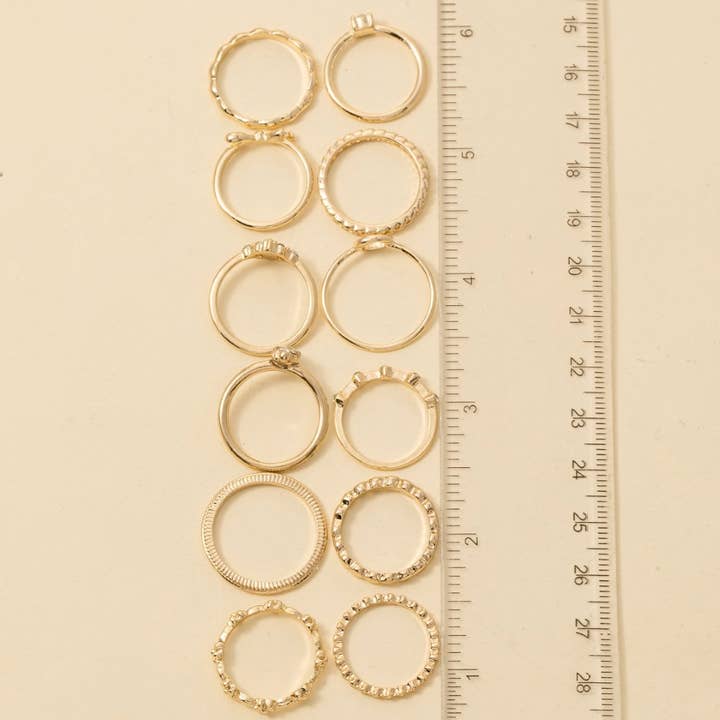 GDCRM Assorted Twelve Piece Pearl Ring Set for wholesale on Faire2