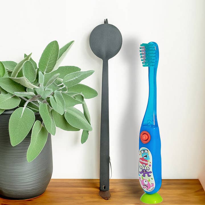 Illuminated toothbrush with 60 second timer. for wholesale by Les Babygators