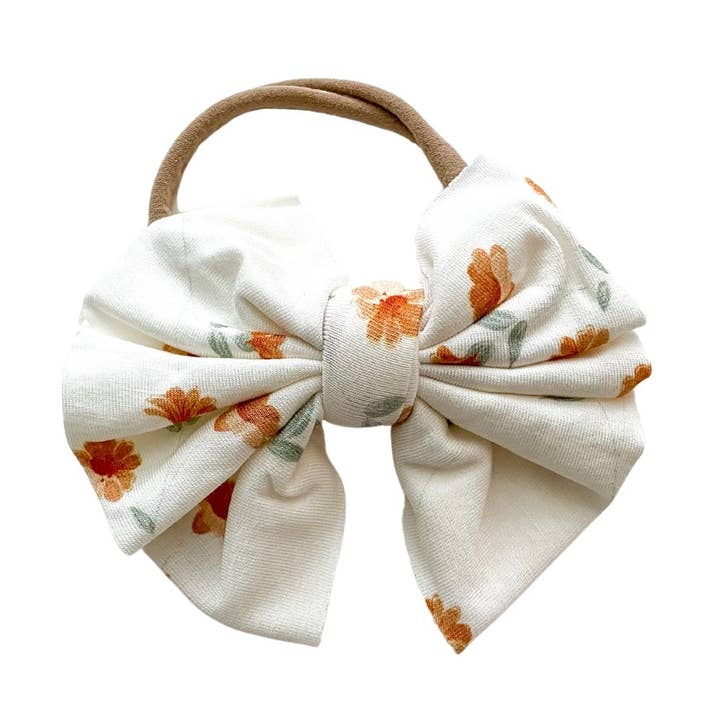 Bandeau nœud floral tombant pour la vente par Harp Angel Boutique