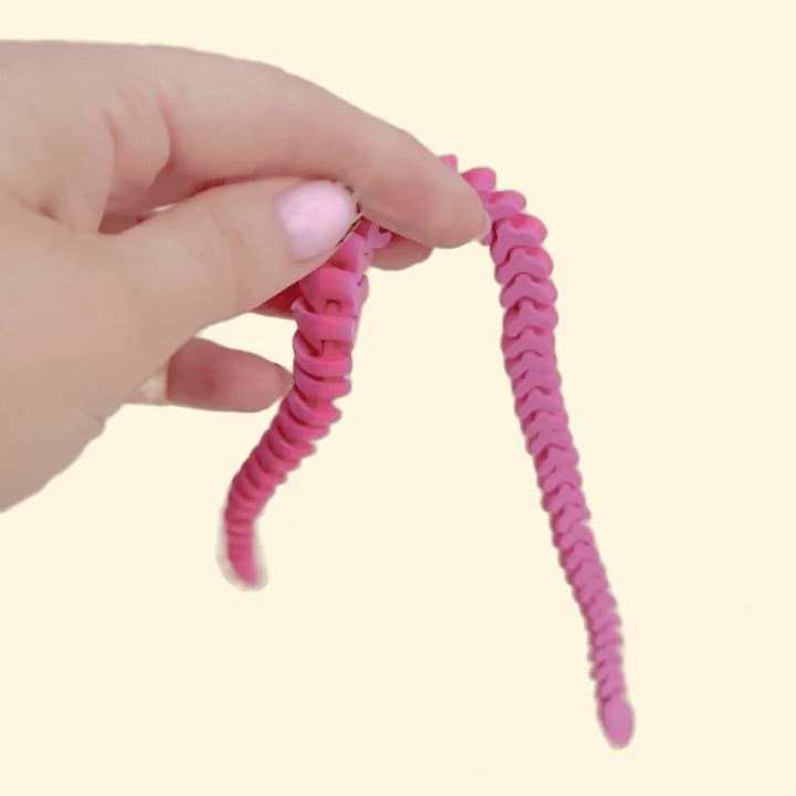 Pink Pop FlexiSnake for engroshandel hos Flexi Fidgets Co. Ltd