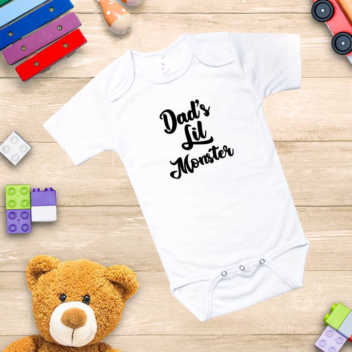 "Dad's Lil Monster" - Baby Onesie - 100% Polyester for wholesale by ImprintKidsClothing