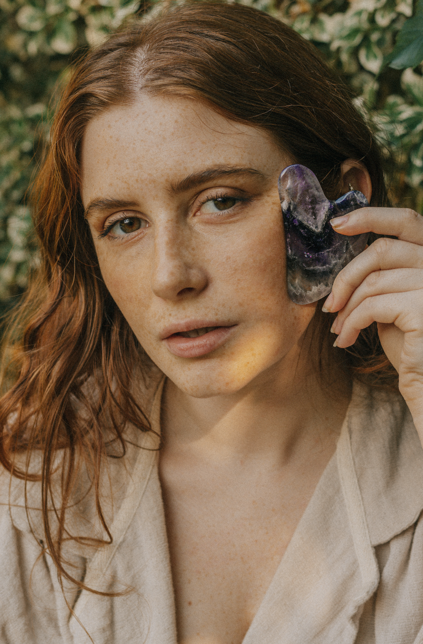 Xander Kostroma - Wholesale Gua Sha Tool - Amethyst Crystal Gua Sha with Black Skull Pouch1