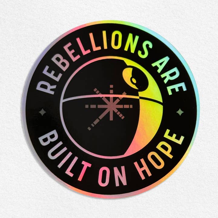 Adhesivo holográfico Rebellions Are Built On Hope para venta al por mayor de MacGuffin Goods