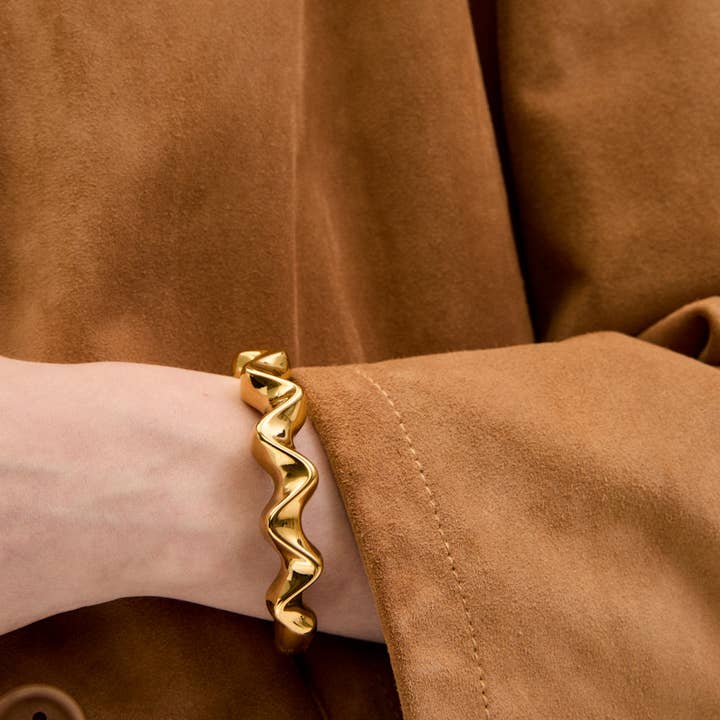 BRACELET RITA WAVY STEEL. GOLD - N64 for wholesale by NALI'