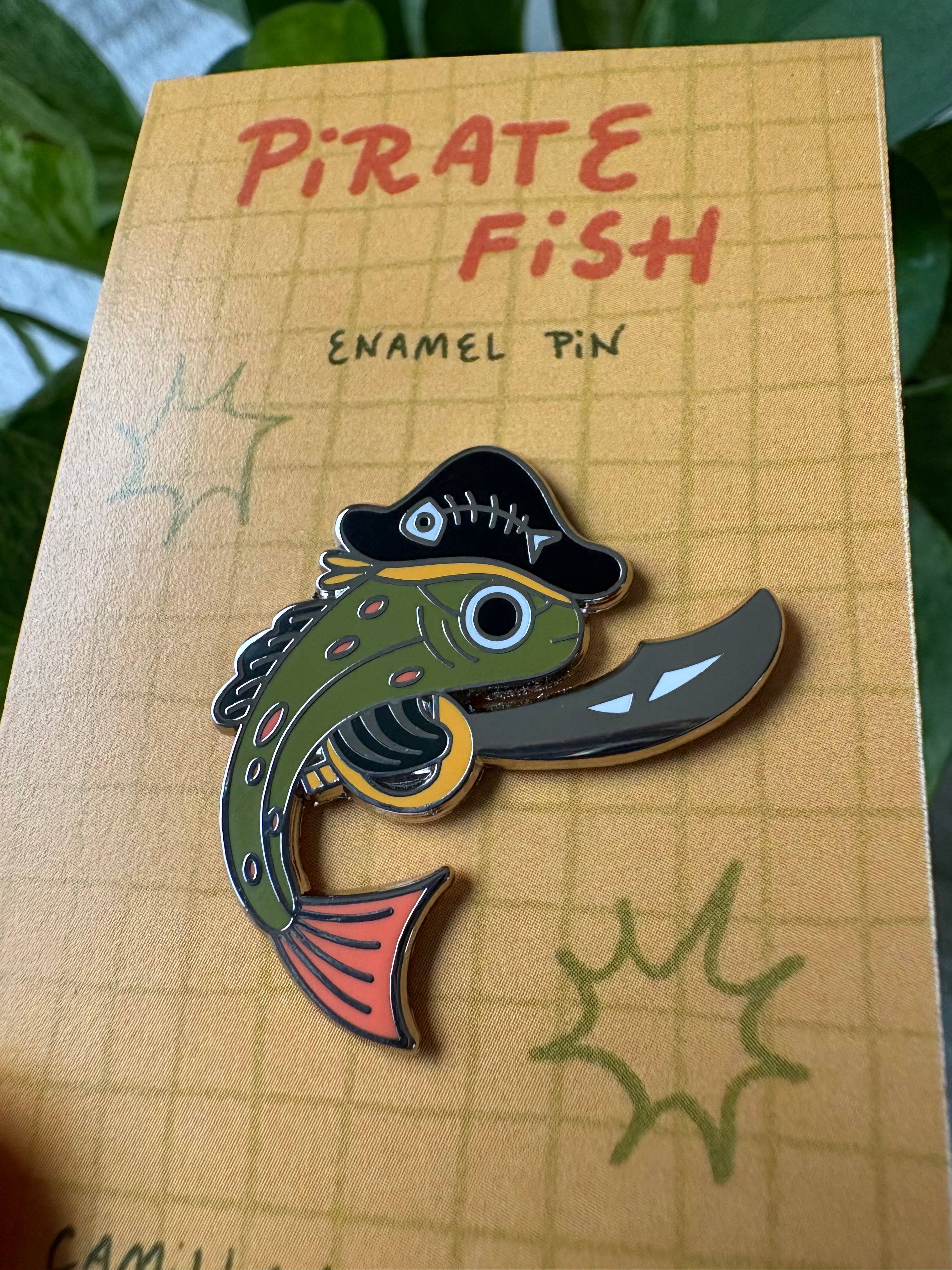 Camilla Watson Art - Wholesale Lapel Pin/Button - Pirate Fish Enamel Pin1