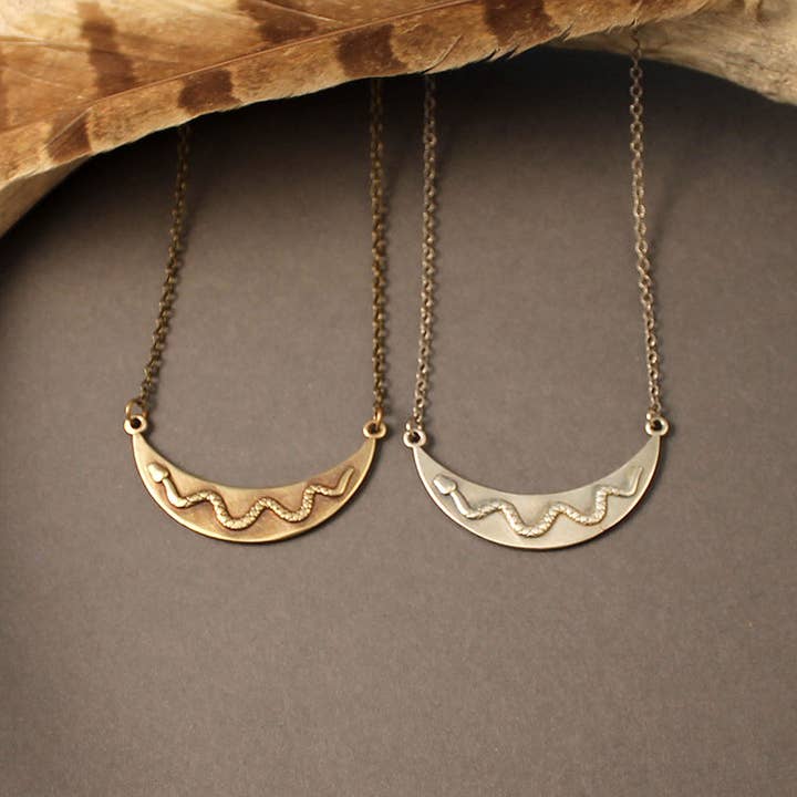 Snake crescent necklace in silver or brass for wholesale by Crow Jane Jewelry