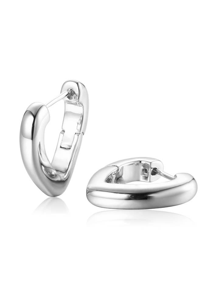 Boucles d'oreilles La Lumière Intérieure – Cœur Immobile pour la vente par Tilary Limited