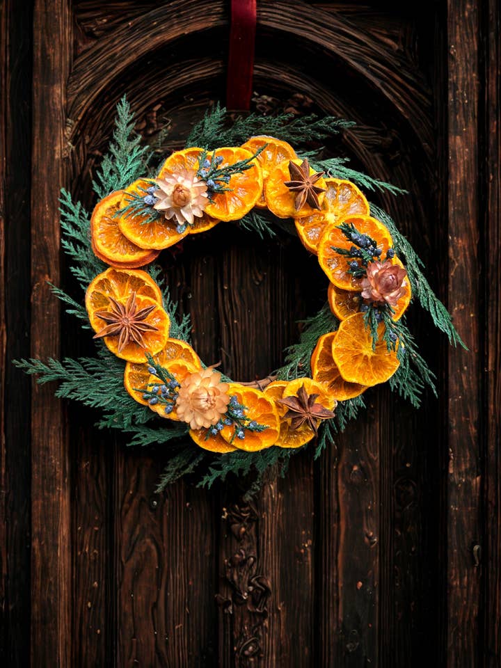 Dried Orange and Evergreen Winter Wreath for wholesale by Wyldcraft Woods