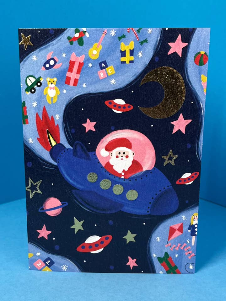 Santa in Space Christmas Card for wholesale by Milk Studio