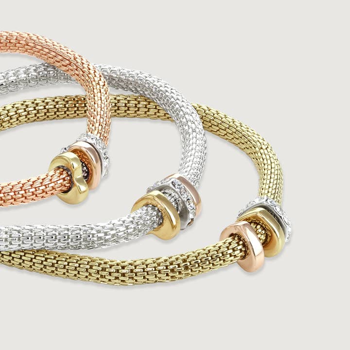 Set di tre braccialetti in rete con tre rondelle per la vendita all'ingrosso da parte di Buckley London