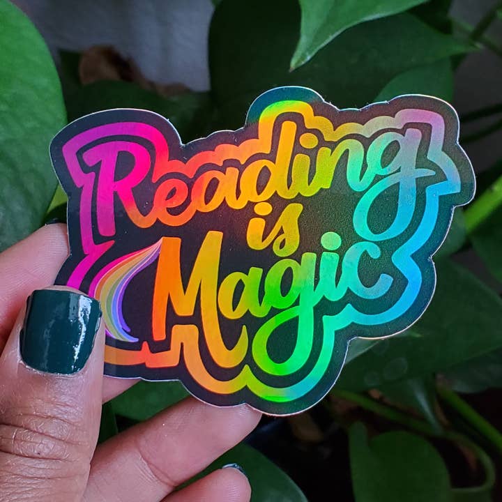 Reading is Magic Rainbow Holographic Sticker - BLACK for wholesale by Nerd Lady Designs