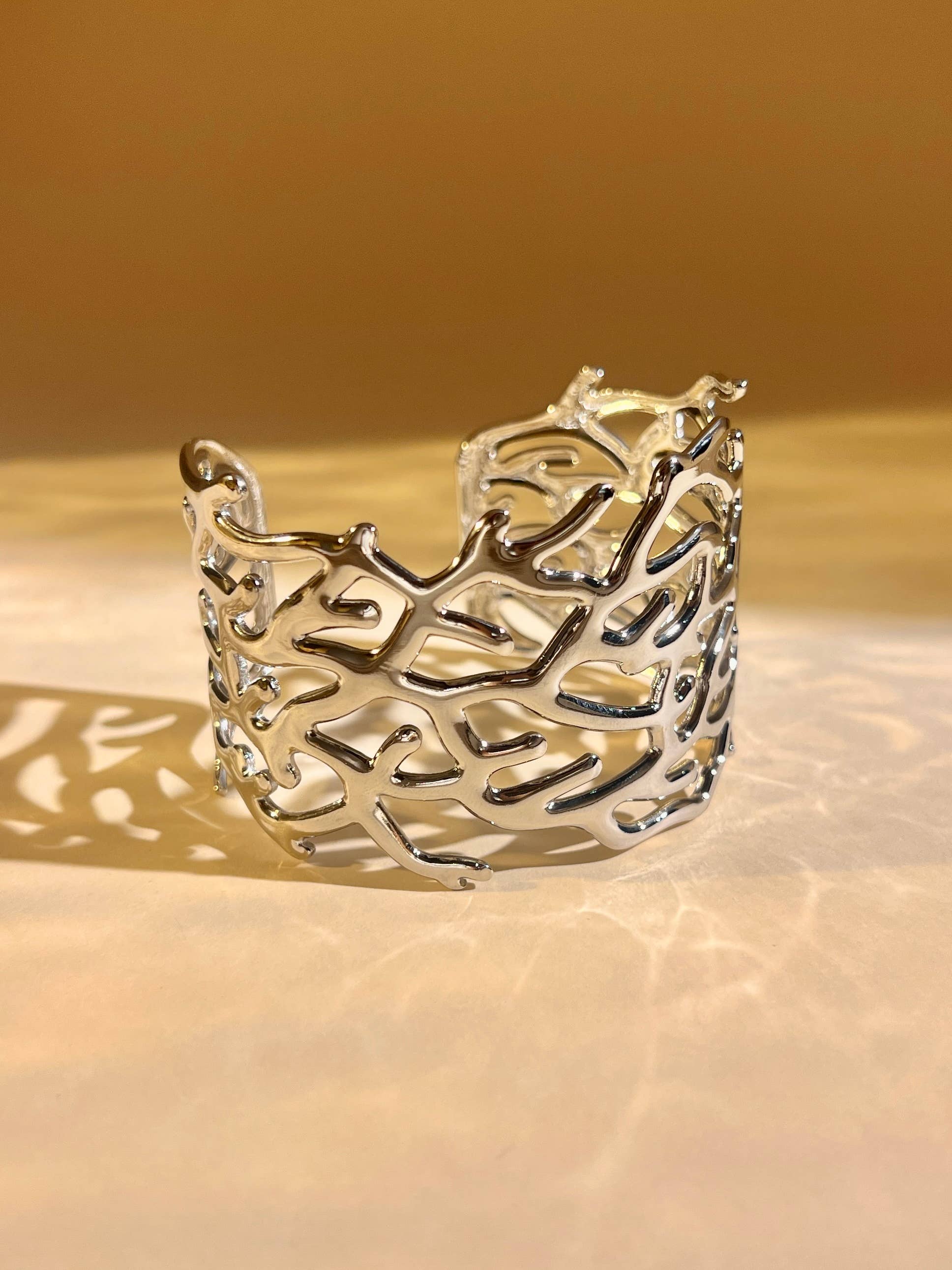 COSMOS - Wholesale Cuff Bracelet - Gold openwork cuff bracelet – chic coral design, steel1