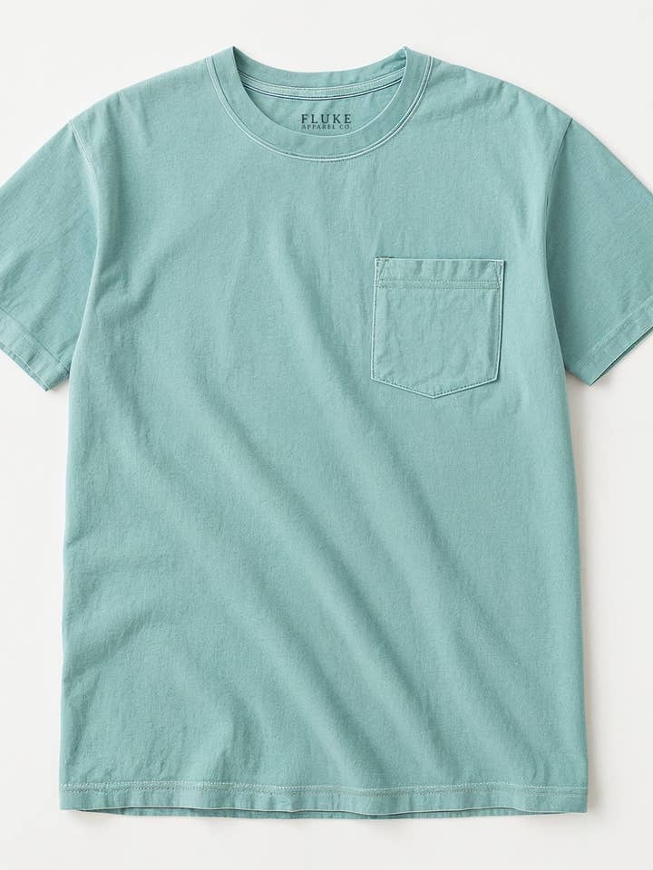 Strandvasket Lomme T-shirt for engroshandel hos Fluke Apparel Company