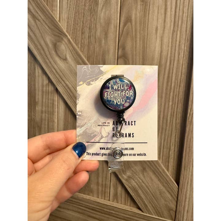 AbstractbyRabrams - Wholesale Badge Accessory - Unisex - I Will Fight For You Badge Reel - Trans Pride Badge Reel