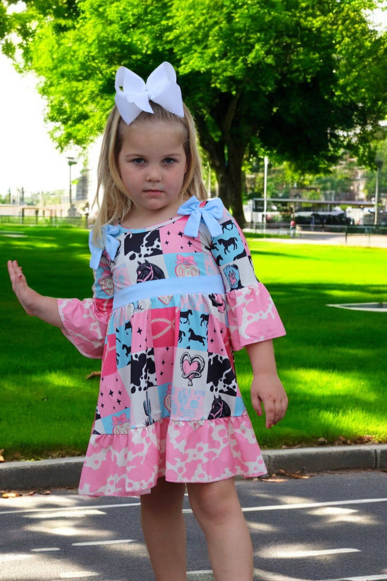 Kids Charm Online - Wholesale Dress - Kids - Beautiful wester patch printed girls dress with bows and cow printed hem.3