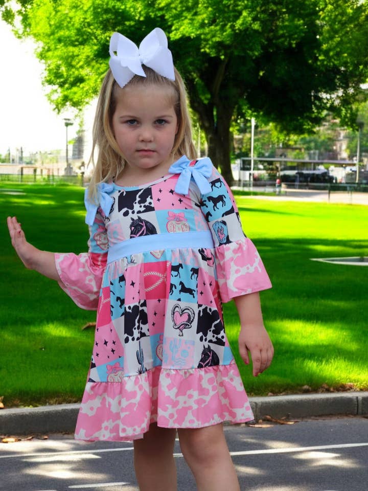 Kids Charm Online - Wholesale Dress - Kids - Beautiful wester patch printed girls dress with bows and cow printed hem.3
