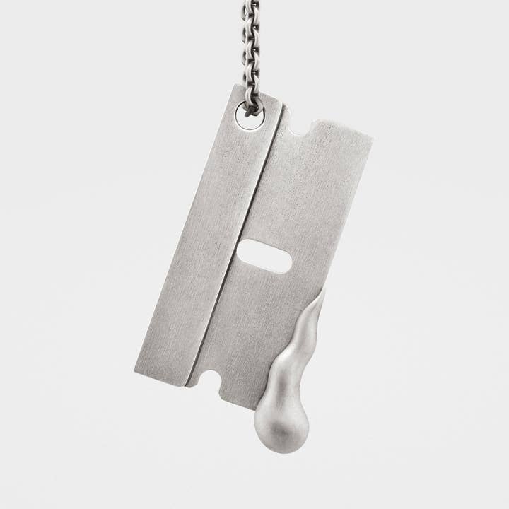 "Sharp Edge" Razor Pendant in Sterling Silver for wholesale by Snake Bones