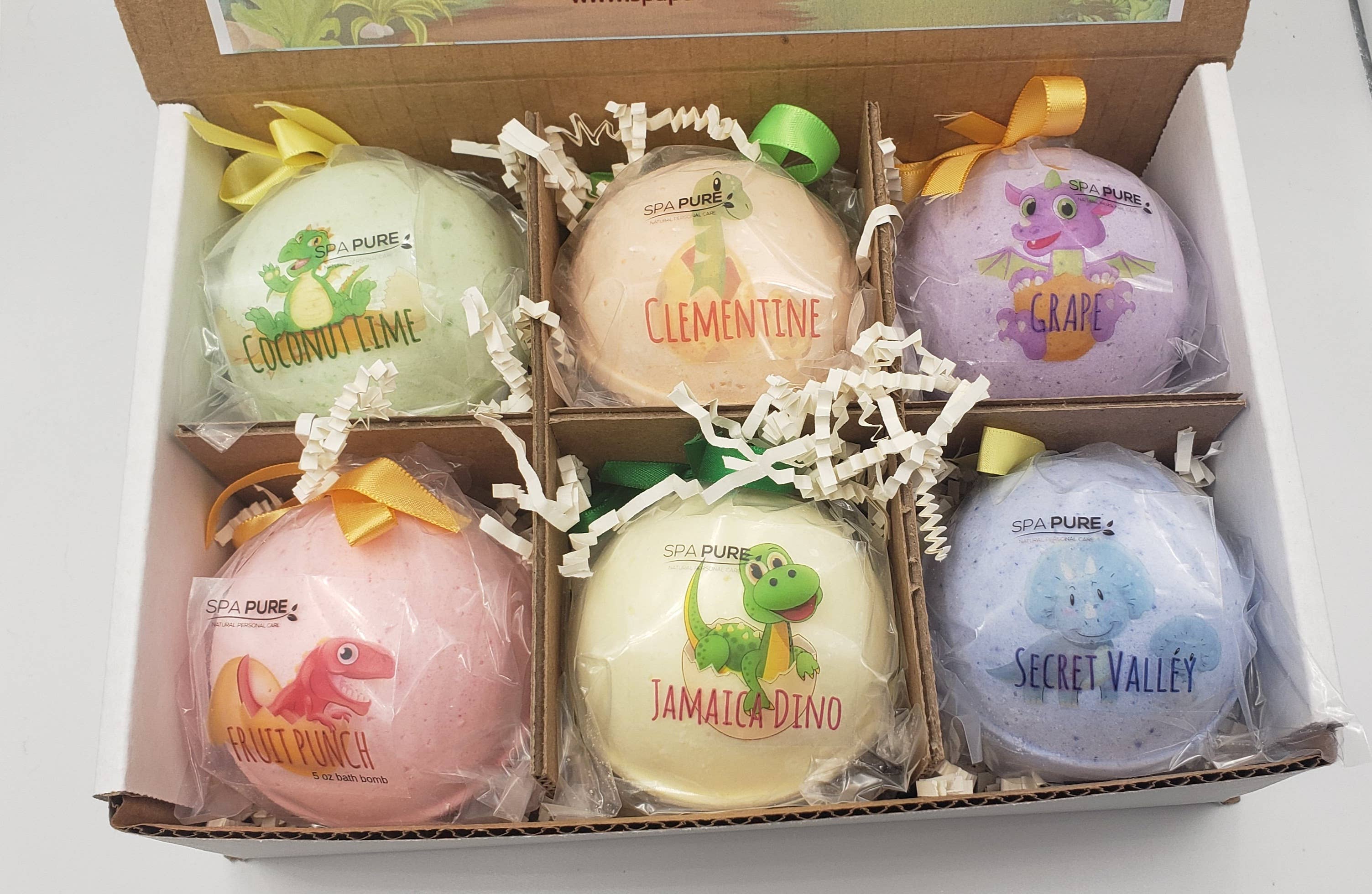 Spa Pure, inc. - Vente Bombe de bain/poudre effervescente pour le bain - Bombe de bain en forme de dinosaure pour enfants avec jouets surprises à l'intérieur, paquet de 121