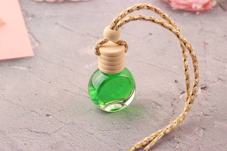 Candles Meta – wholesale Car Freshener - Unisex – Flat Circular Shape Car Air Freshener Diffuser Empty Bottle5