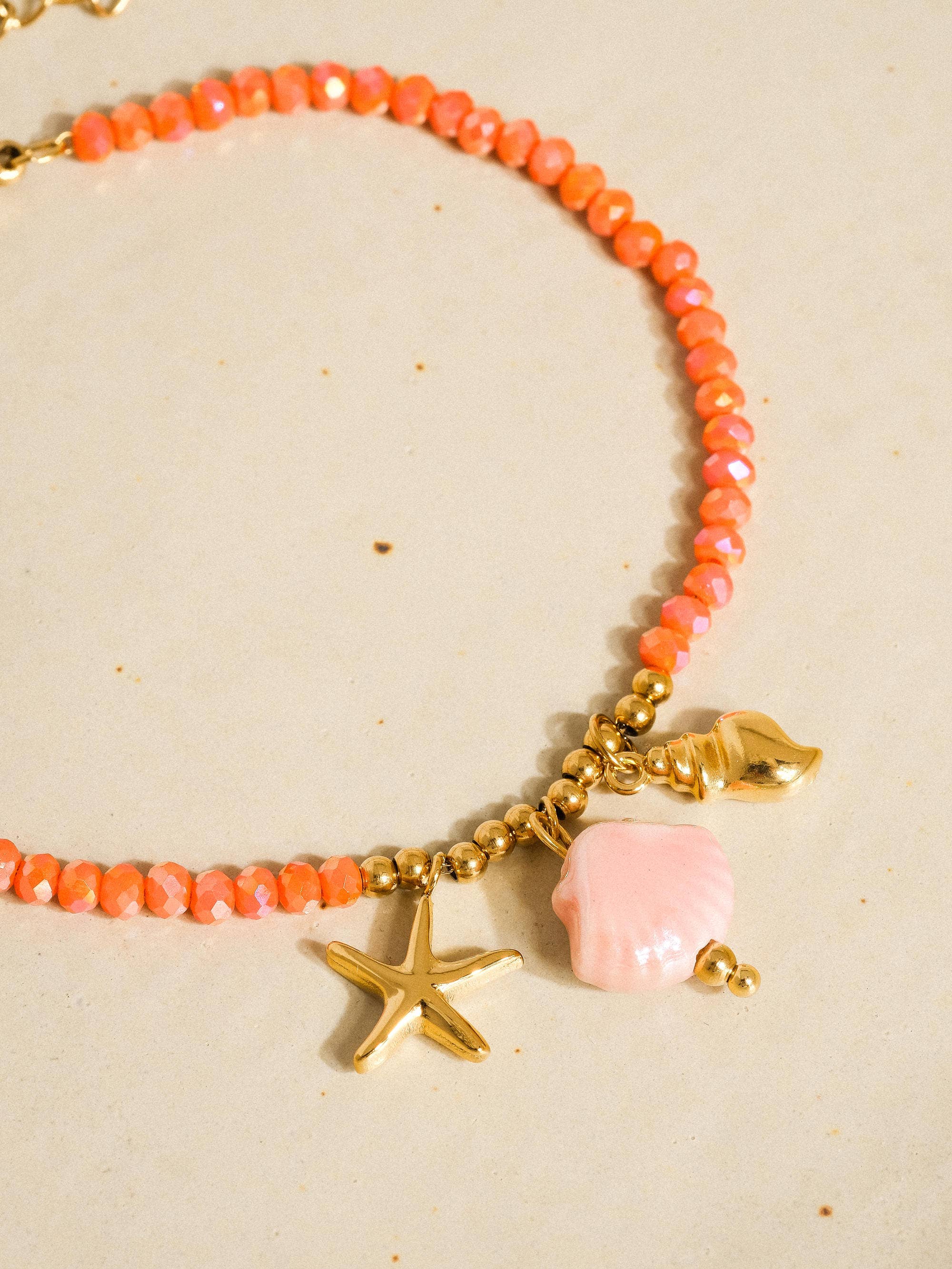 Pink Fawn 18K Gold Non-Tarnish Shells and Star Beaded Bracelet for wholesale on Faire1