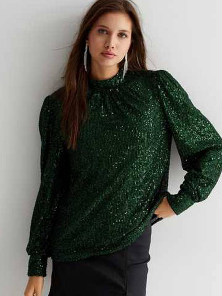 Green Sequin High Neck Loosefit Blouse and other Purchase wholesale new collection clothing. Free returns & net 60 terms on Faire trending on Faire.