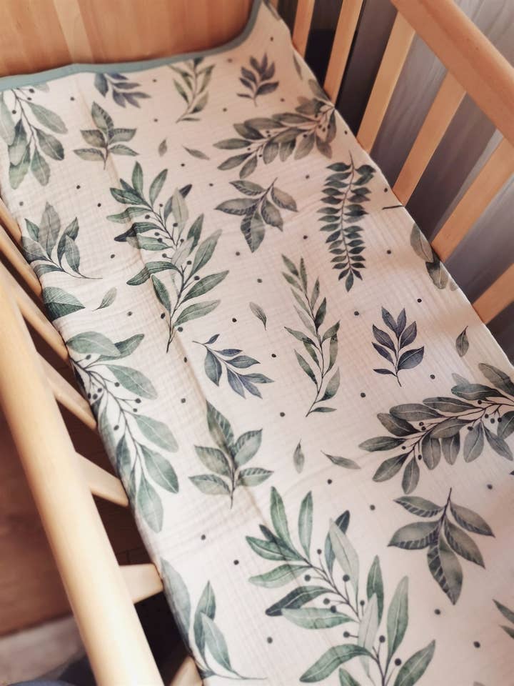 Mythology Green Leaves Organic Muslin Blanket for wholesale by Baby Laurel Organics