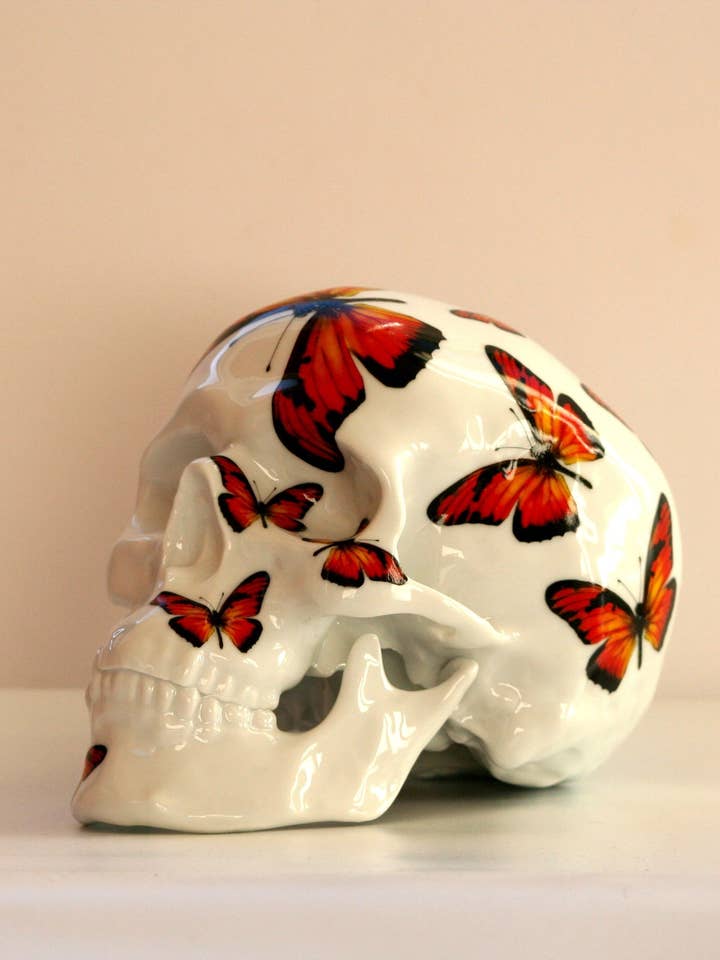 CRÂNIO BORBOLETA VERMELHA BY NoON por atacado de K.Olin Tribu