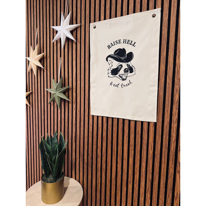 Uncommon Wild - Wholesale Banner - Raise Hell & Eat Trash Raccoon Canvas Banner