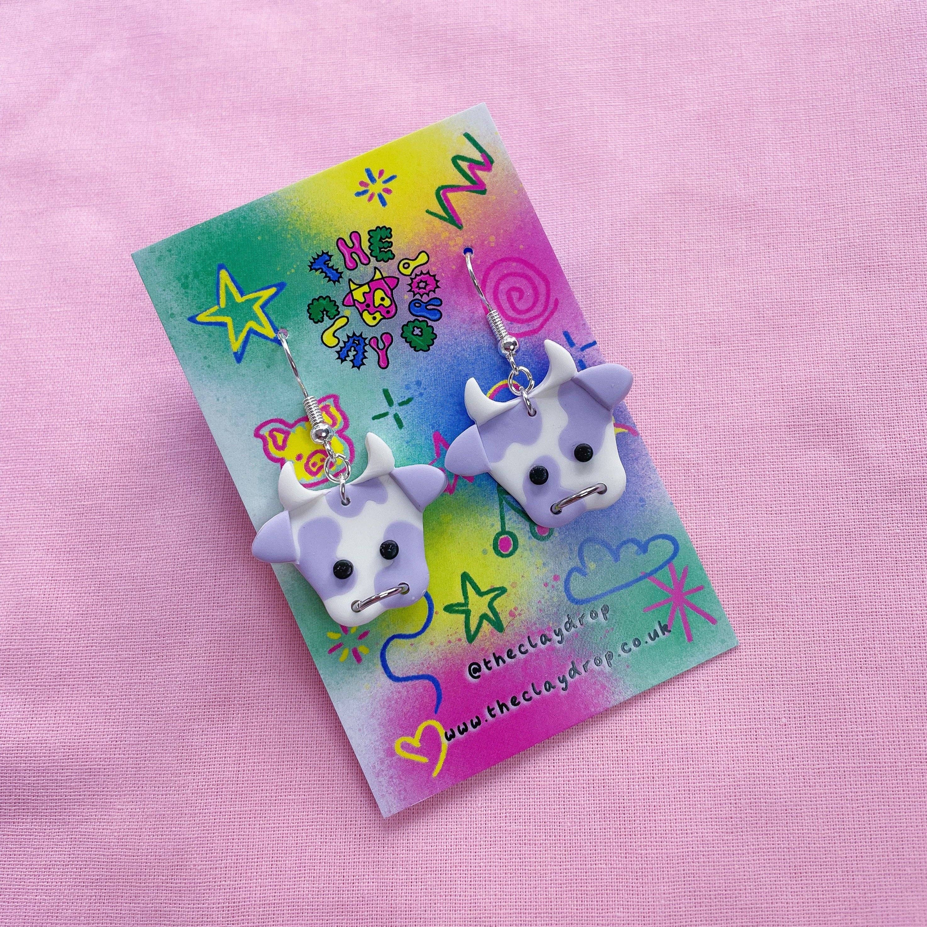 The Clay Drop - Wholesale Dangle Earrings - Purple & White Cow Polymer Clay Earrings - 2 Sizes2