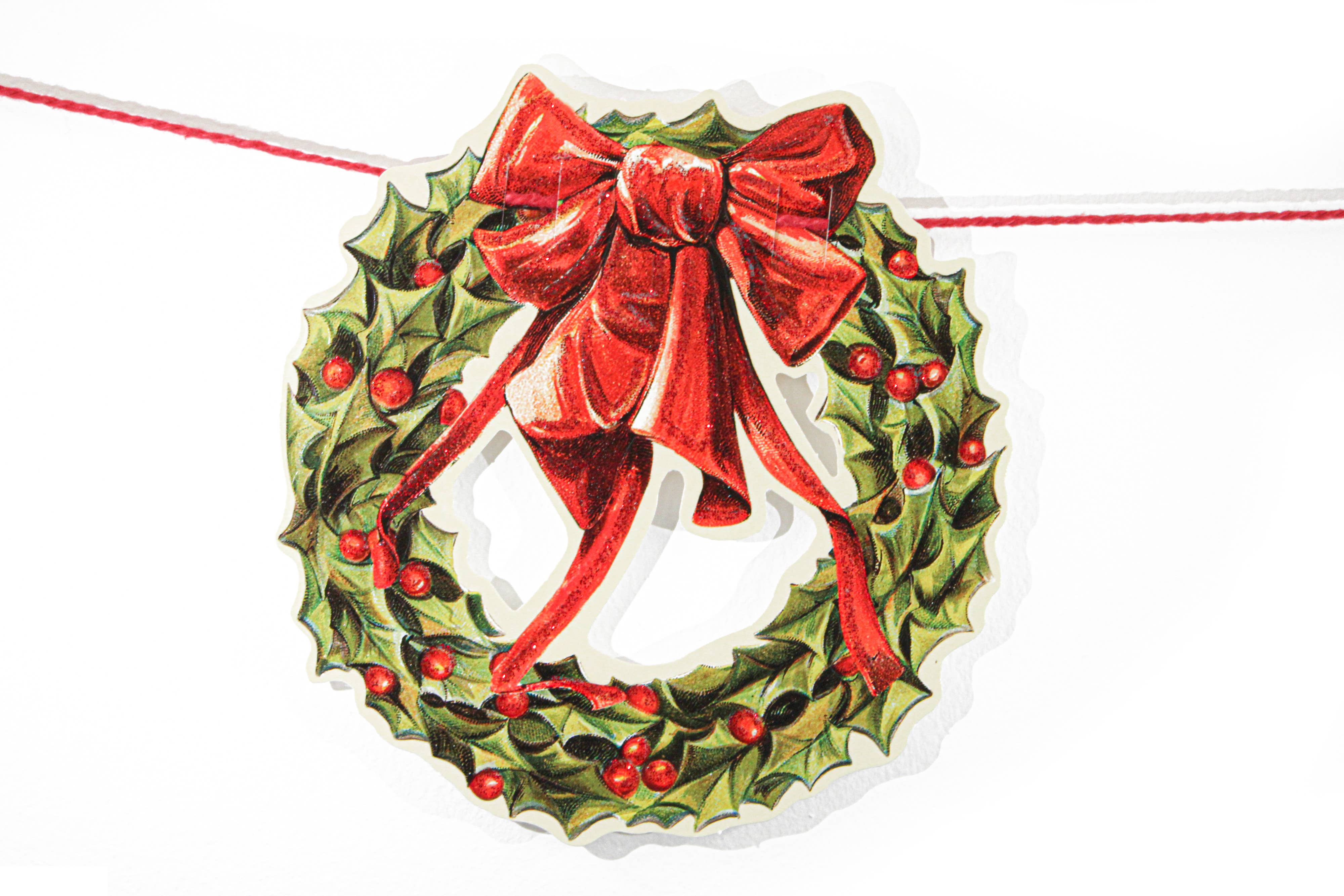 Mamelok - Vente Fanion/guirlande - Guirlande de couronnes de houx de Noël pailletées1