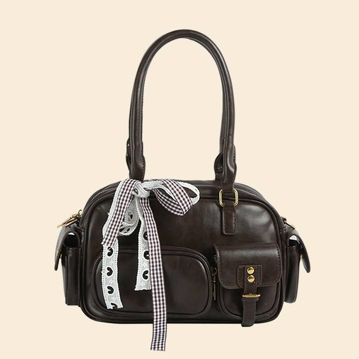 Multi Pocket Leather Hand Bag With Ribbon Bow Charm for wholesale by Anarchy Street