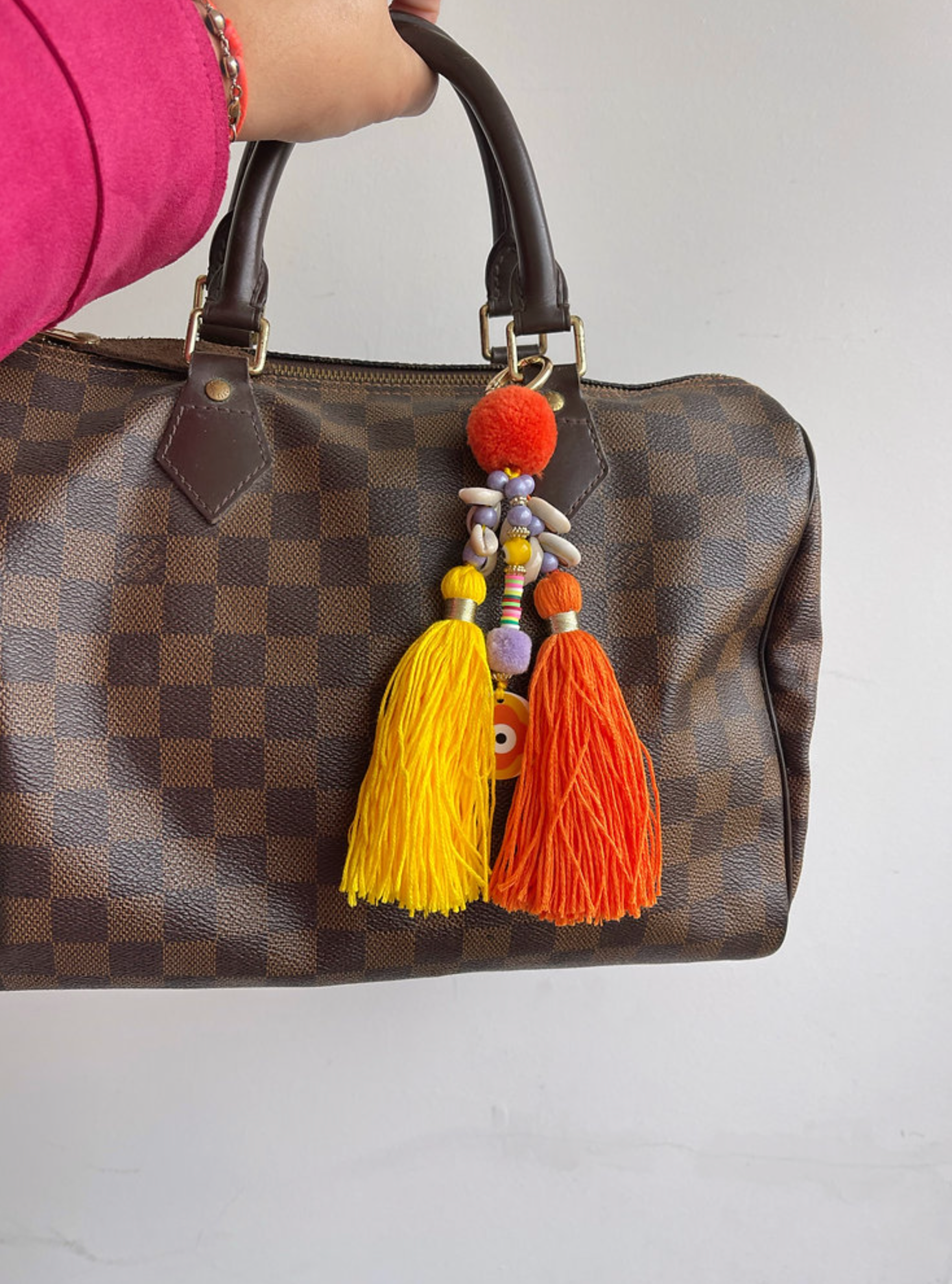 Liviana Lisbon – wholesale Handväske- och väskaccessoar – Dam – VÄSKDEKORATION GRIGRI ORANGE POMPOM1