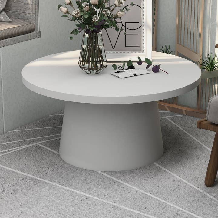 Dune Round 32" Wide Coffee Table in Fiberstone for wholesale by LeisureMod