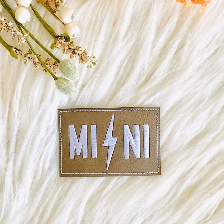 Mini embroidered leather hat patch for wholesale by R & R Stitched