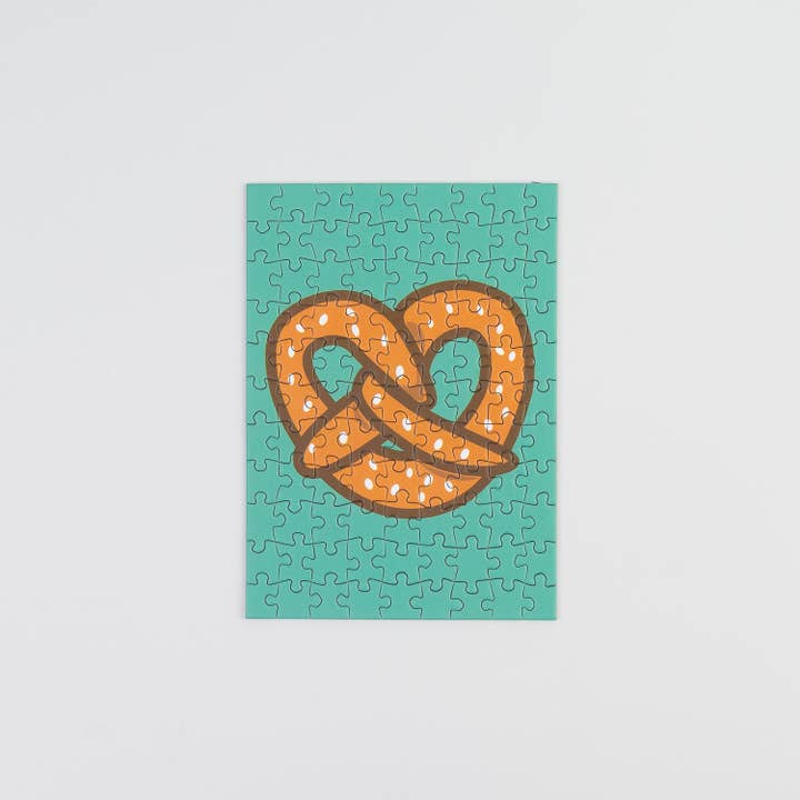 Sunshine Puzzles - Wholesale Puzzle - Adult - THE PRETZEL, 99 Piece Mini Puzzle1