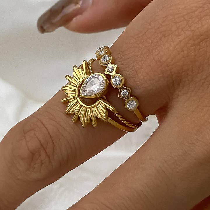 Françoise 18K Gold Non-Tarnish Sun Stone CZ Layered Ring and other Purchase Wholesale cubic zirconia jewelry. Free Returns & Net 60 Terms on Faire trending on Faire.