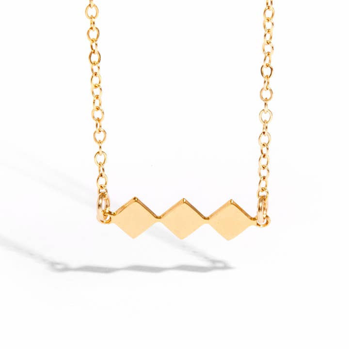 Vesta - Tiny Diamonds Shapes Necklace for wholesale by Aviv Jewelry