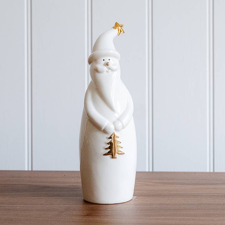 Père Noël en céramique blanc et or pour la vente par We Love Seasons Ltd