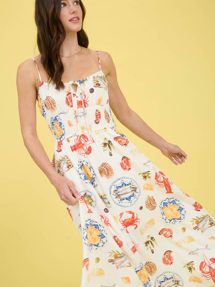 IVORY MULTI SEASIDE LUNCH PRINT SPAGHETTI STRAP MIDI DRESS for wholesale on Faire