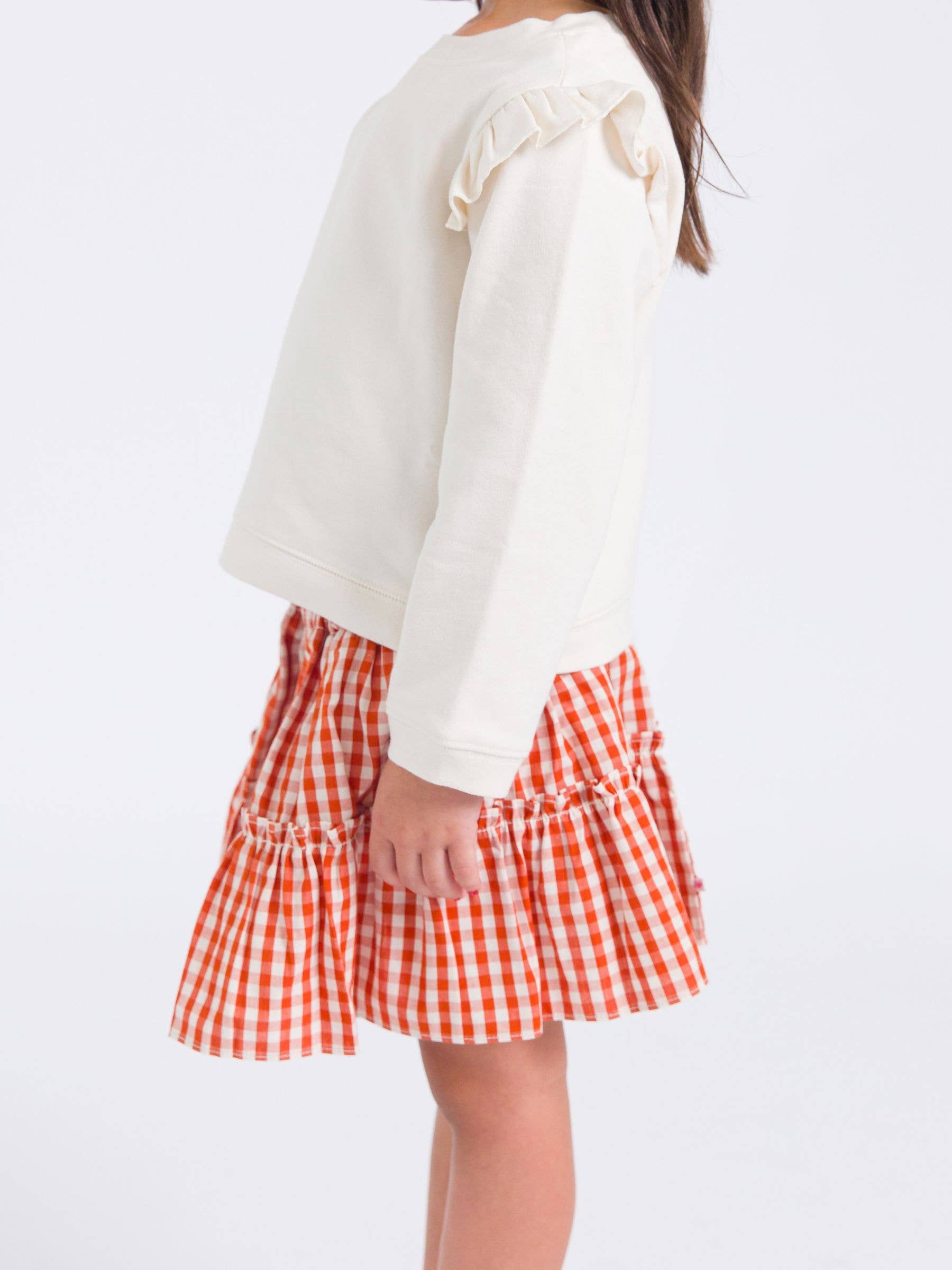 Orange Girls Classic Rust Gingham Smocked Twirl Skirt for wholesale on Faire2